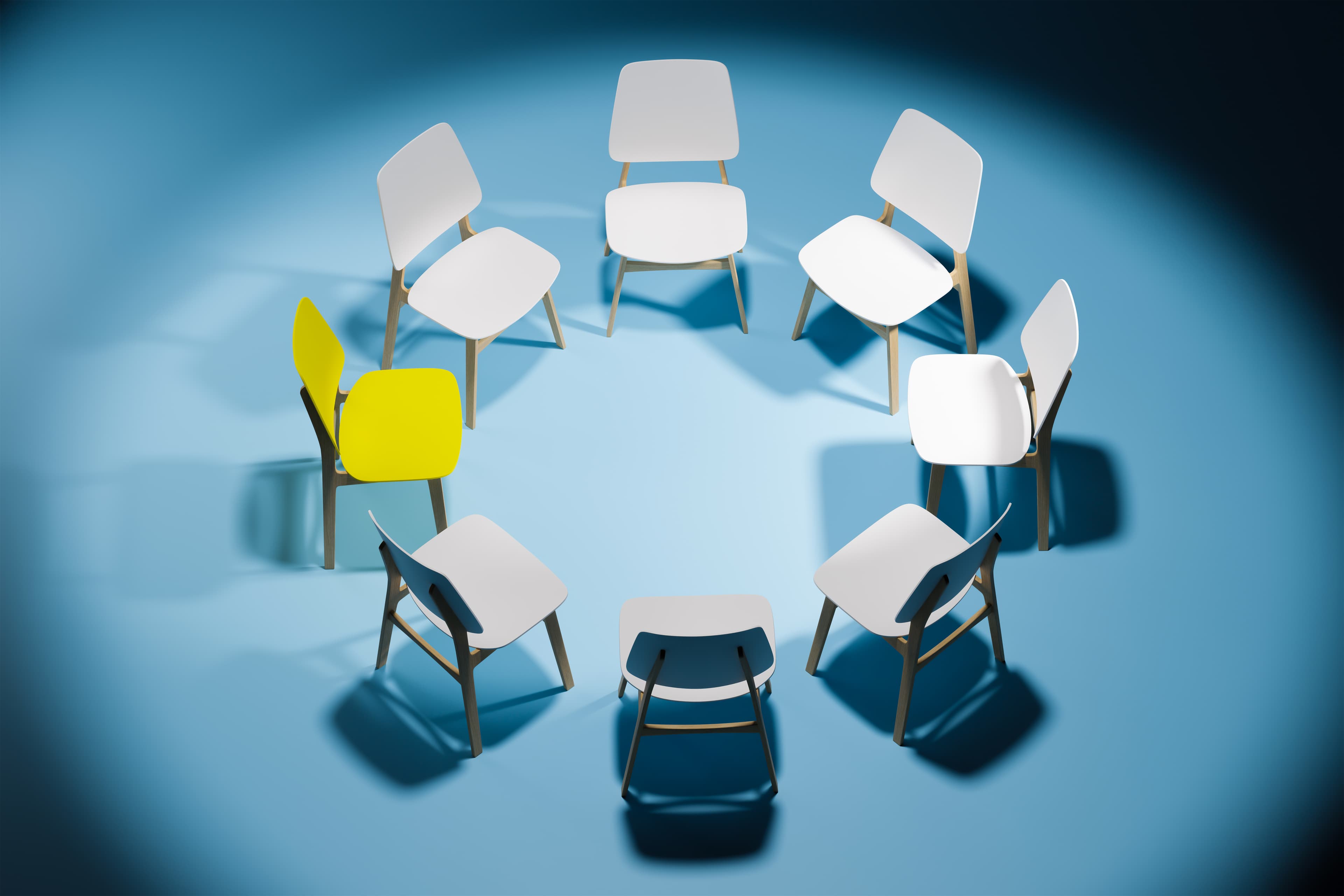 A circle of chairs, one highlighted in yellow, representing ASLPC's governance structure